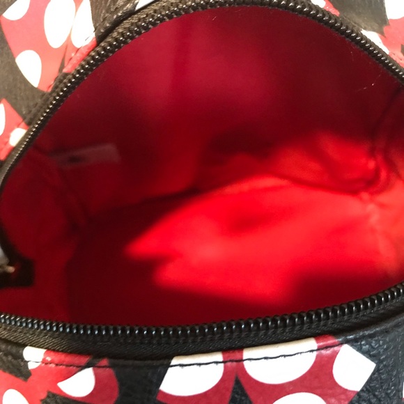 A beautiful Mini Disney Backpack with one packet outside. - Picture 5 of 9